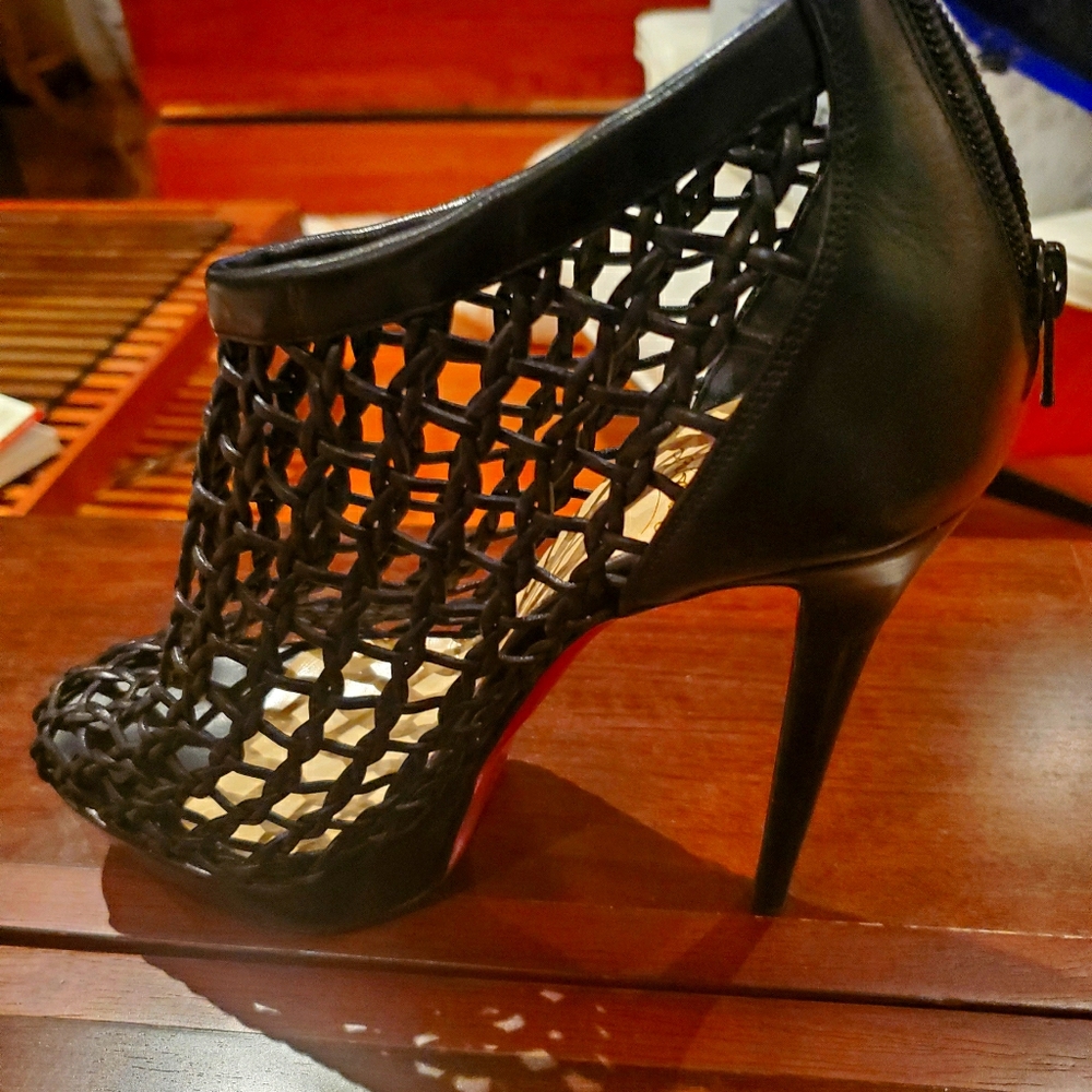 Christian Louboutin stilettos)